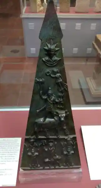 Deity with bull on a triangle relif